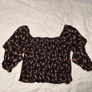 Black flower off the shoulder top